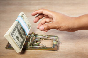 Photo of money trap courtesy of Shutterstock